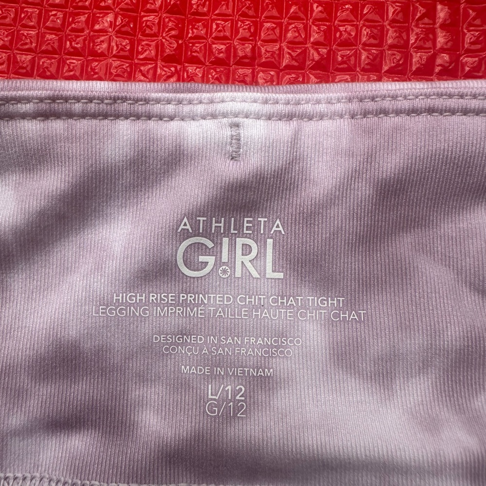 NWT ATHLETA GIRL
HIGH RISE PRINTED CHIT CHAT TIGHT
LEGGING size L 12 - Picture 4 of 7